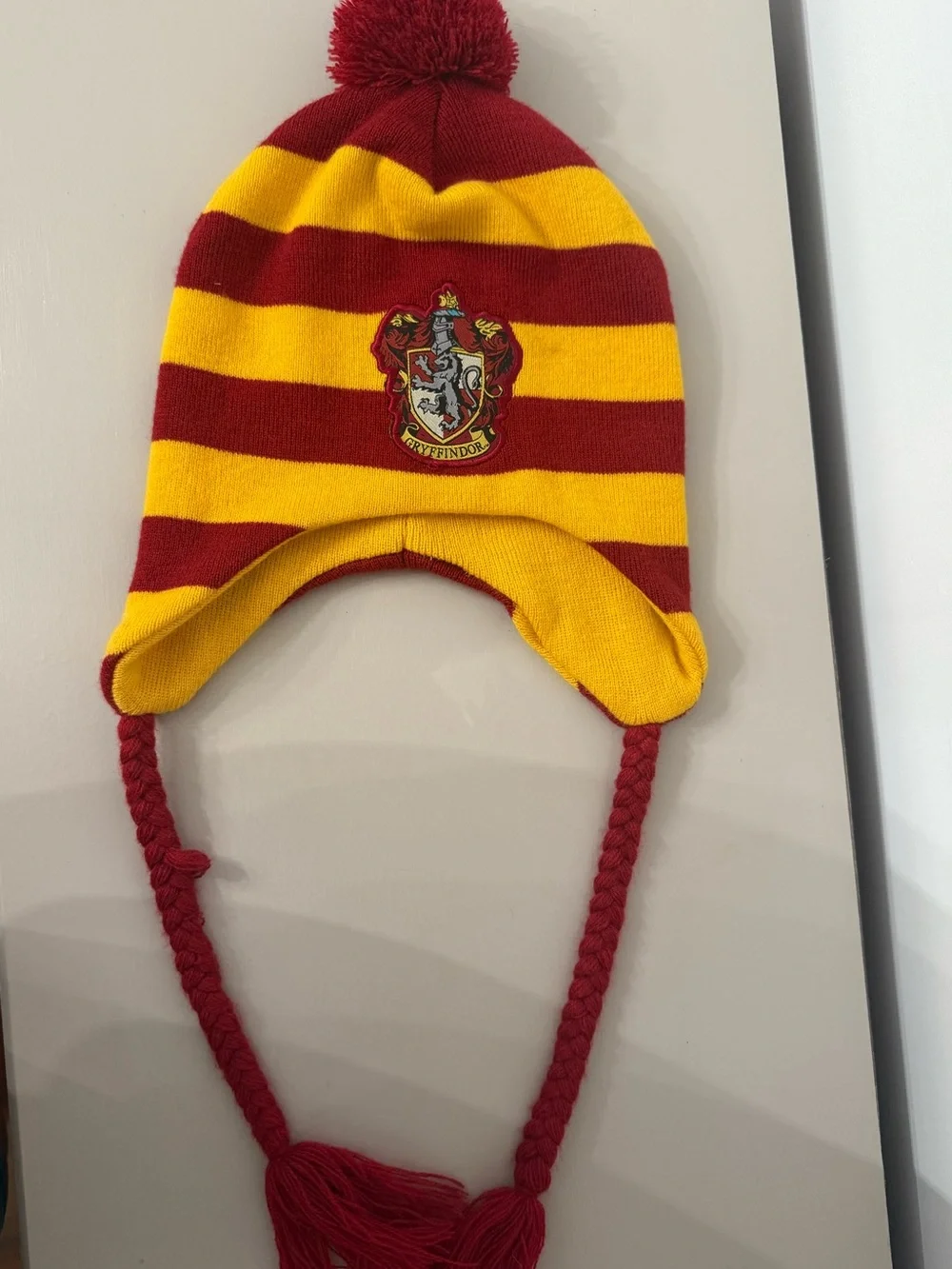 Gryffindor Red & Yellow Striped Pom Pom Earflap Hat